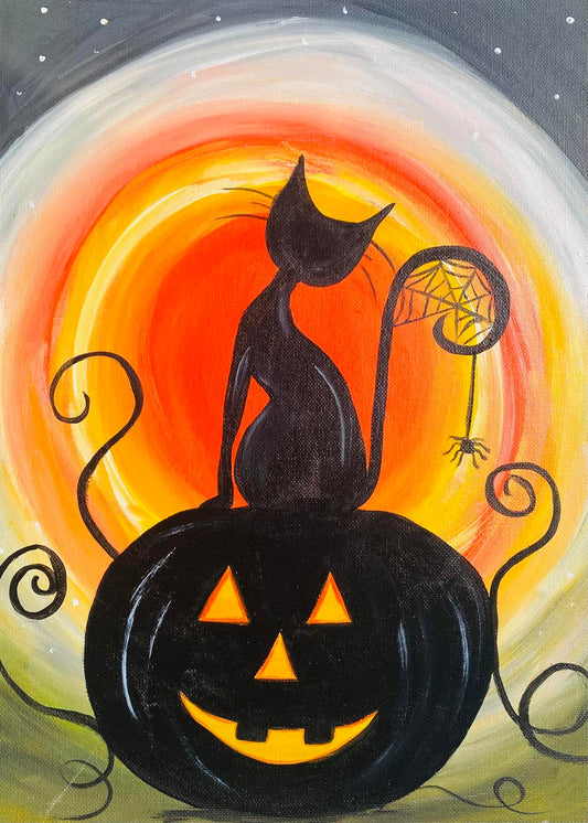 Cat on a Jack O Lantern